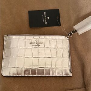 Kate Spade Metallic Silver Embossed Wristlet
